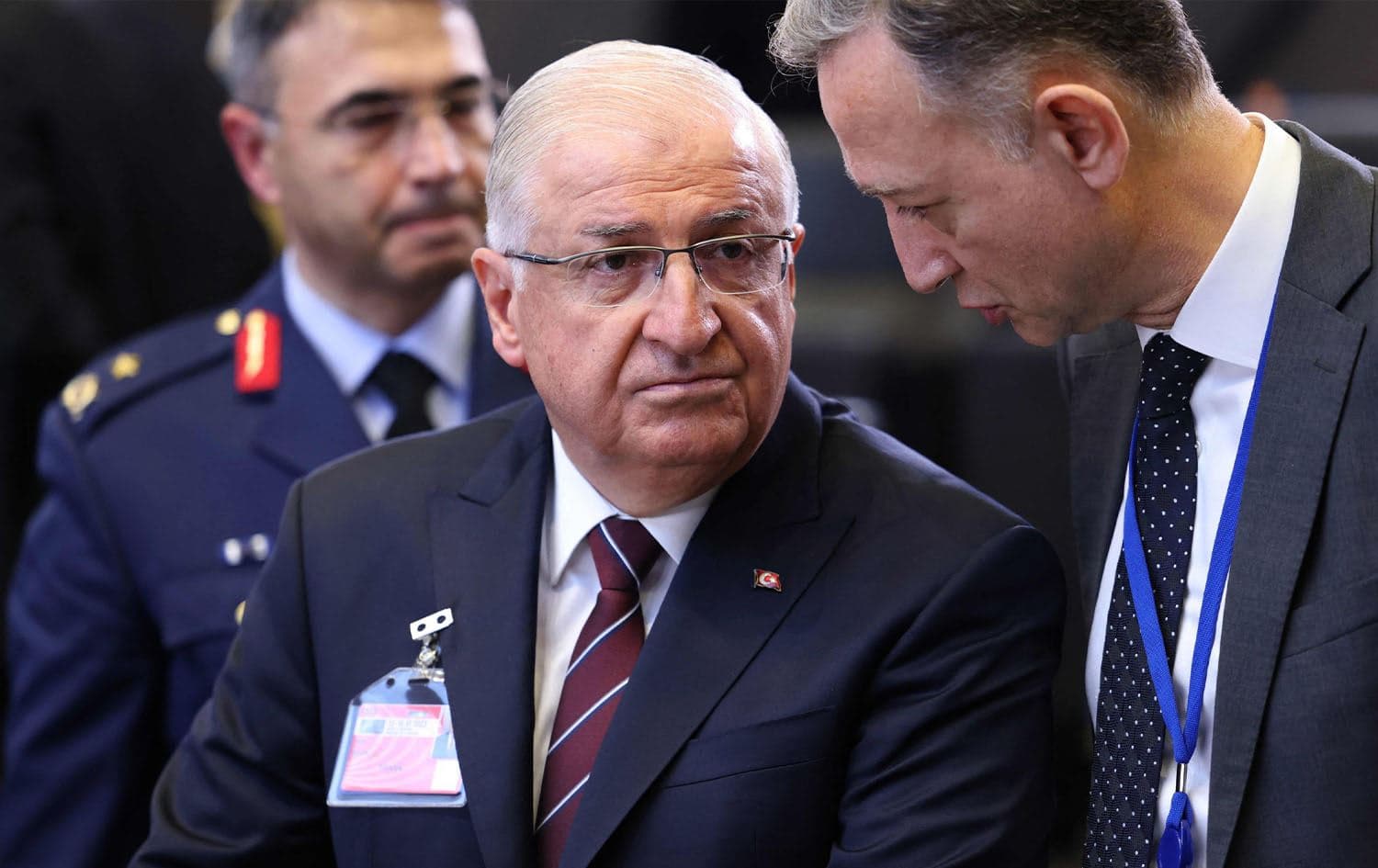 Turkish Defense Minister Yasar Guler (L) looks on prior to a meeting at the NATO headquarters in Brussels, Belgium, June 15, 2023. Photo: AFP