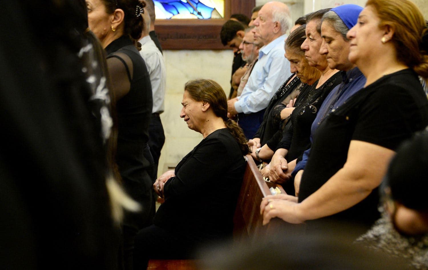 Mourners attend a mass for the victims of the wedding hall fire at a church in Hamdaniya, also known as Qaraqosh or Bakhdida, on September 28, 2023. Photo: AFP 