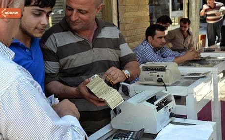 Money changing hands in Erbil. Kurdistan's economy may be too dependent on short term oil gains. . 