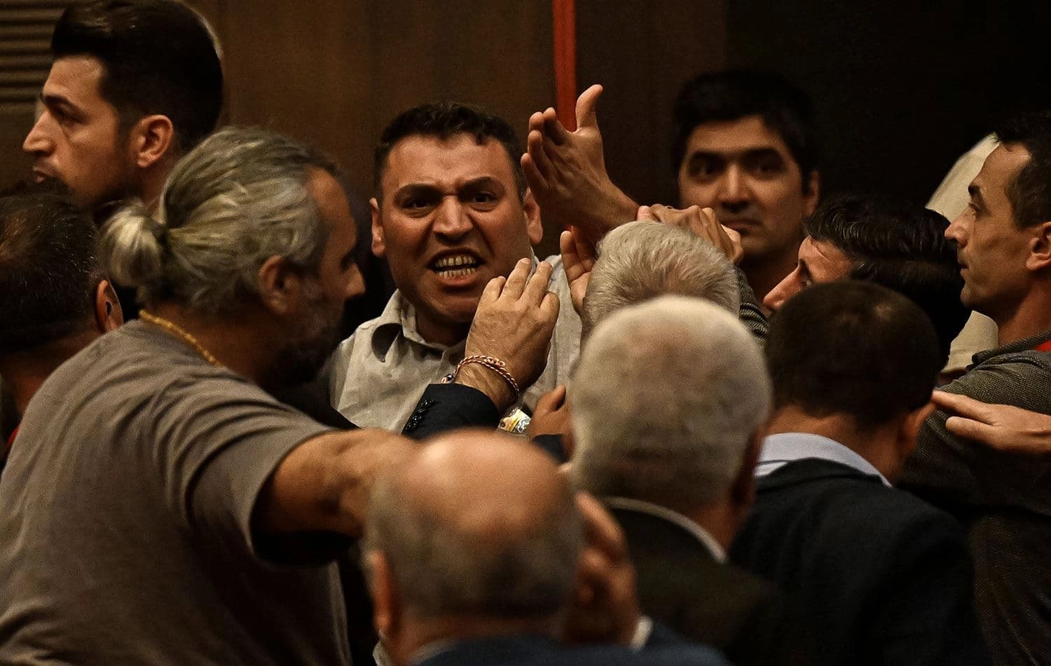 CHP Sultangazi İlçe Başkanı Kemal Avseren'in konuşması sırasında arbede çıktı. / AA