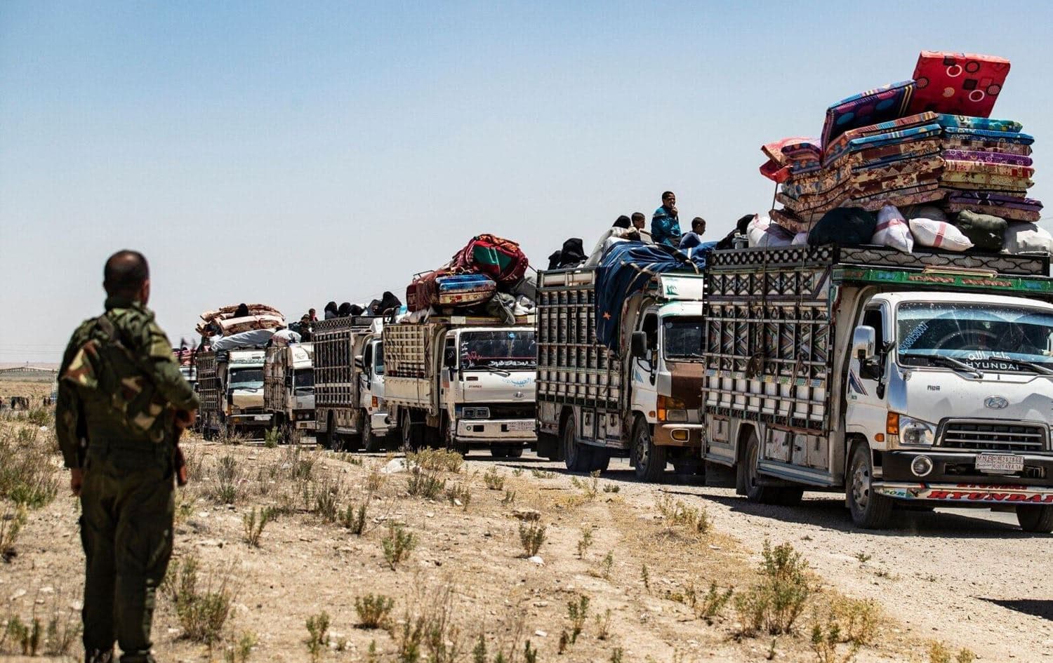 ISIS-affiliated families leaving al-Hol camp in Syria's Hasaka. File Photo: AFP