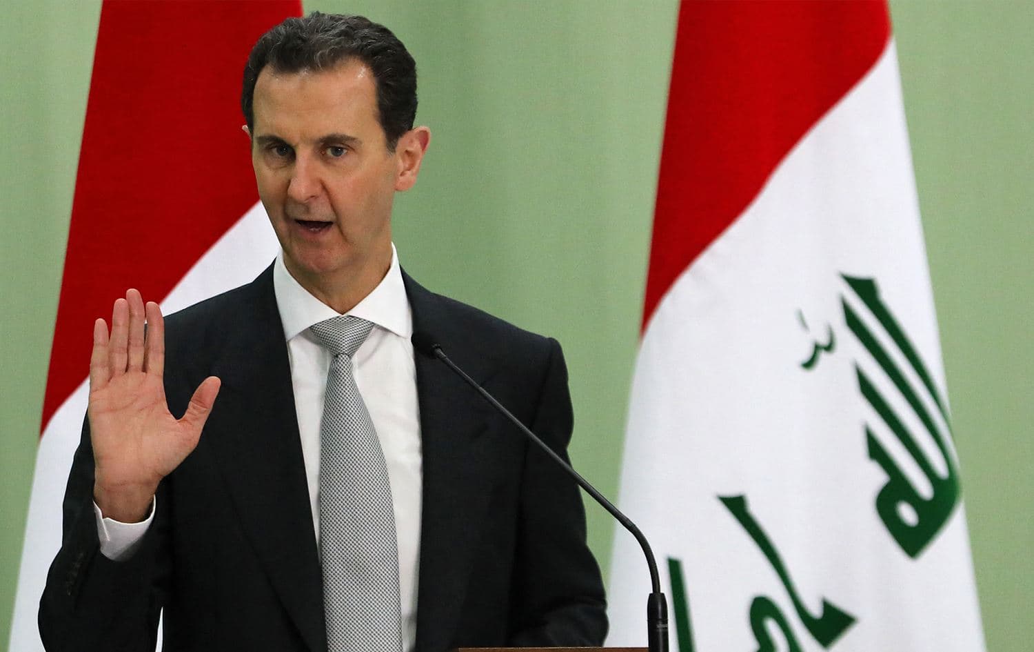 This photograph taken in Damascus on July 16, 2023 shows Syria's President Bashar al-Assad speaking during a press conference. Photo: Louai Beshara/AFP 