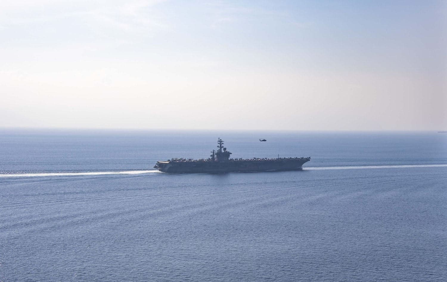USS Dwight D. Eisenhower (CVN-69) (IKE) transits the Strait of Hormuz as the Dwight D. Eisenhower Carrier Strike Group (IKECSG) makes an inbound transit to the Arabian Gulf on November 26, 2023. Photo: US Navy