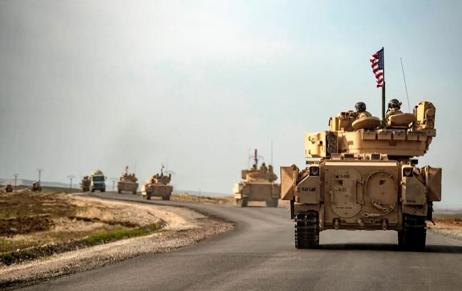  US soldiers in Bradley tanks patrol an area near Syria's northeastern Semalka border crossing with the Kurdistan region on January 12, 2021. Photo: DELIL SOULEIMAN/AFP