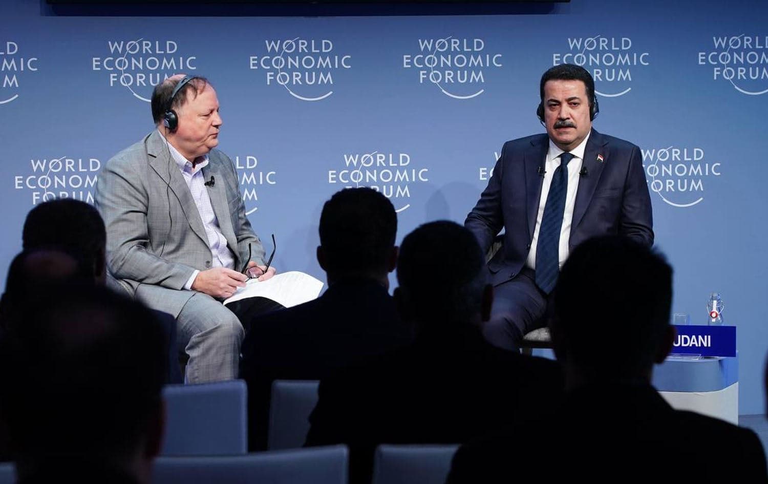 Iraqi Prime Minister Mohammed Shia' al-Sudani (right) speaking during a panel on the sidelines of World Economic Forum in Davos, Switzerland on January 18, 2024. Photo: PM Sudani's office