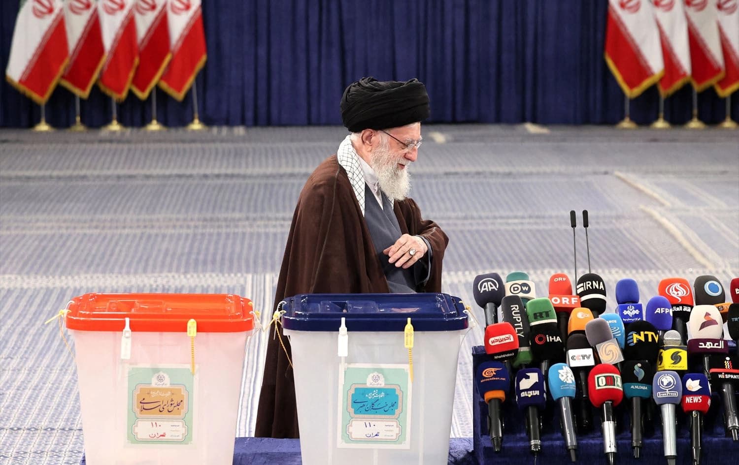 Iran's supreme leader Ayatollah Ali Khamenei sets out to speak after casting his votes during the parliamentary and key clerical body elections at a polling station in Tehran on March 1, 2024. Photo: ATTA KENARE / AFP