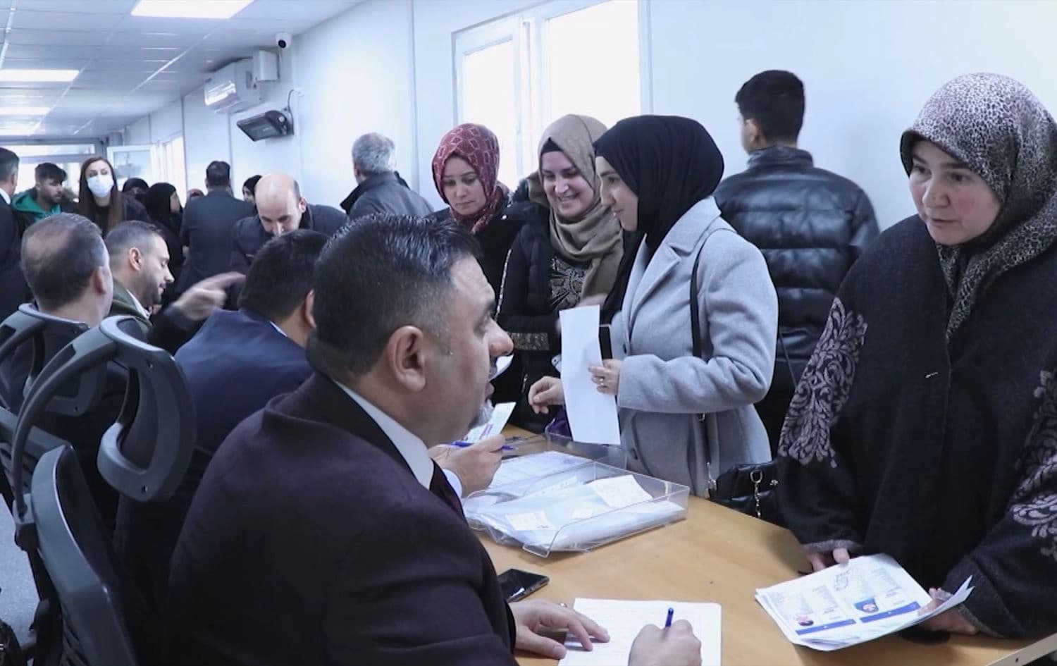 Iraqi nationals queue before the nationality proof committee in Ankara on March 29, 2024. Photo: Rudaw/Screengrab
