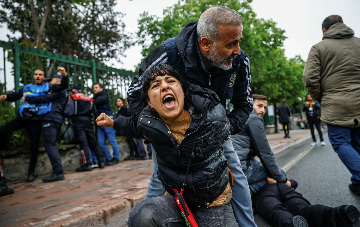 Turkish police detain a protester as she and others attempt to march to Taksim Square, at Mecidiyekoy district near Taksim, during a Labour Day rally in Istanbul on May 1, 2024. Photo: Kemal ASLAN / AFP