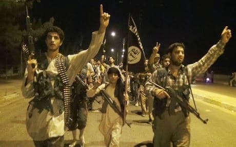 ISIS fighters parading on the streets of Mosul. Photo: ISIS media
