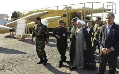 Rouhani visiting a defense industry display. AP photo.