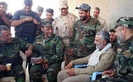 Iranian commander General Qasem Soleimani (seated with checkered scarf) is believed to have played a decisive role in defeating ISIS in Diyala. 