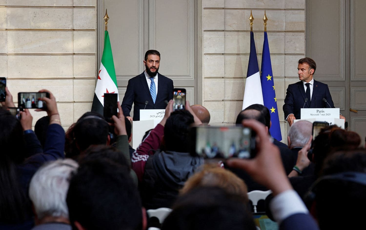  ئیمانوێل ماکرۆن و ئەحمەد شەرع. وێنە: AFP