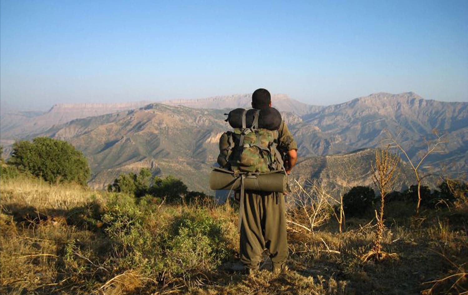 گەریلایەکی پەکەکە لە چیاکانی کوردستان. وێنە: AFP