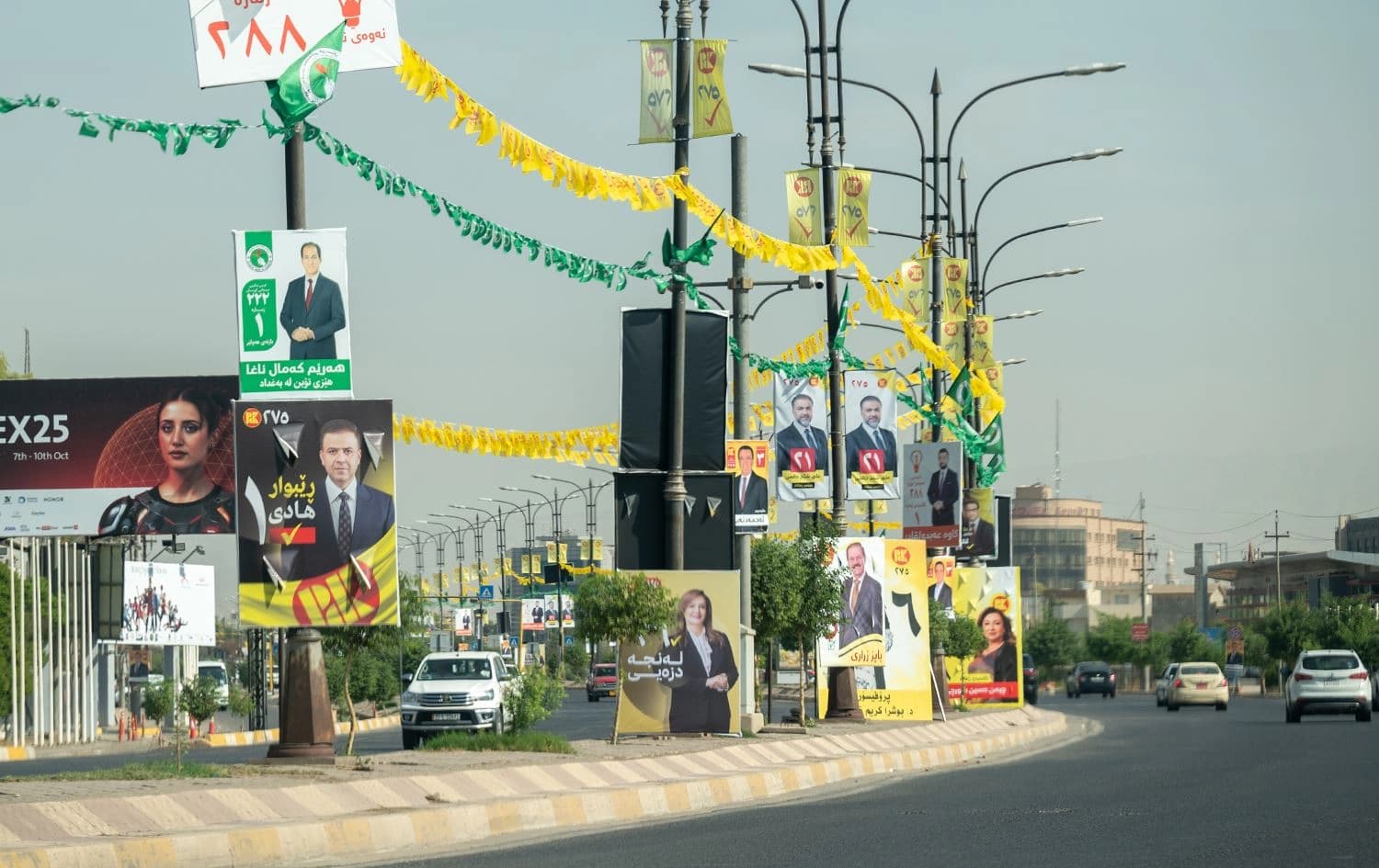 پۆستەری بەربژێرەکانی هەڵبژاردنی پەرلەمانی عێراق لە هەولێر. وێنە: بڵند تاهیر- رووداو