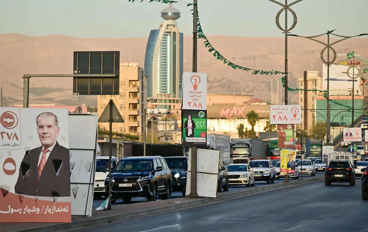 پۆستەری بەربژێران بۆ هەڵبژاردنی پەرلەمانی عێراق لە پارێزگای سلێمانی. وێنە: بڵند تاهیر- رووداو