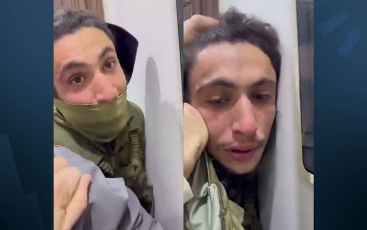Yakalan kişinin üzerinde askeri kıyaferler bulunuyor. 