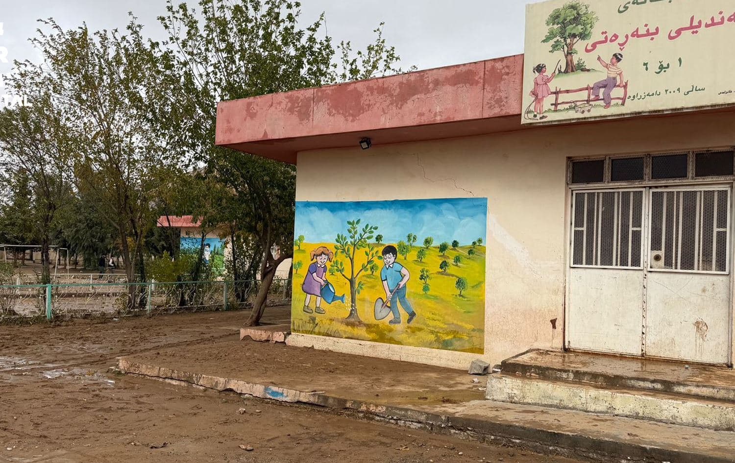 قوتابخانەیەک لە چەمچەماڵ بەهۆی لافاوەکەوە زیانی بەرکەوتووە