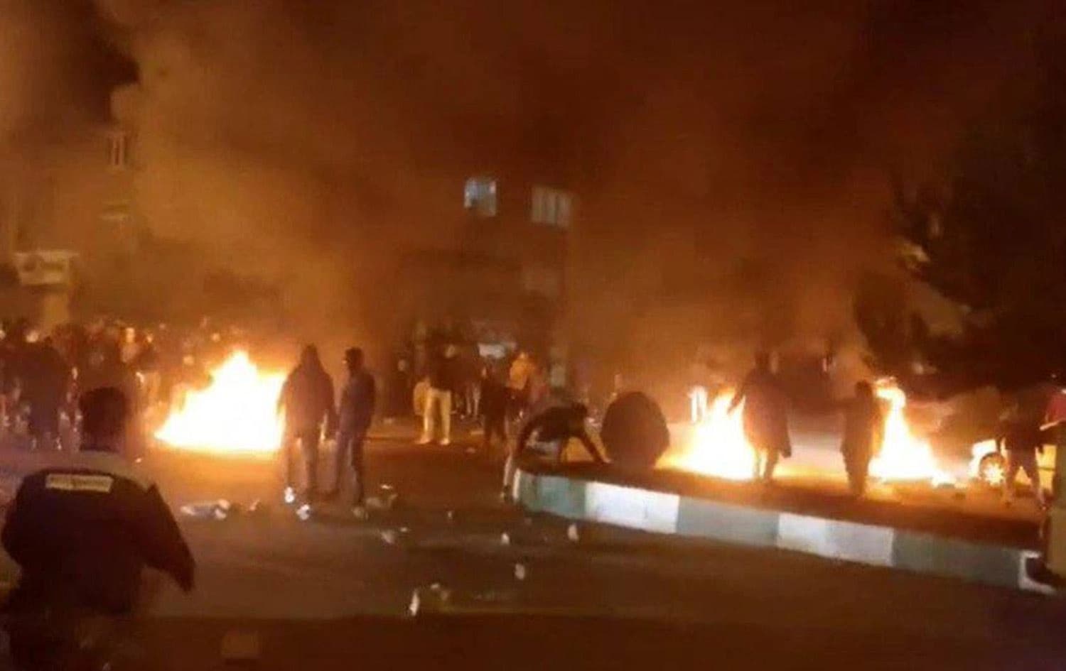 دیمەنێکی خۆپێشاندانەکەی ئێران.