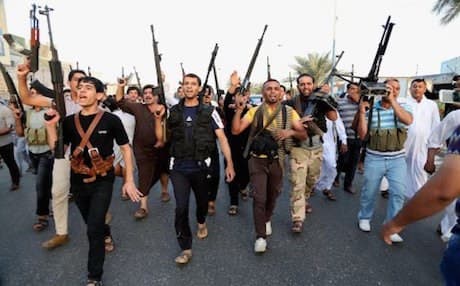 Shiite militia fighters in Iraq.  AP photo.
