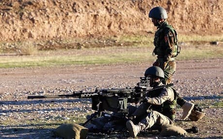 Kurdish Peshmerga training on new weapons supplied to them by their Western allies. Photo: AFP