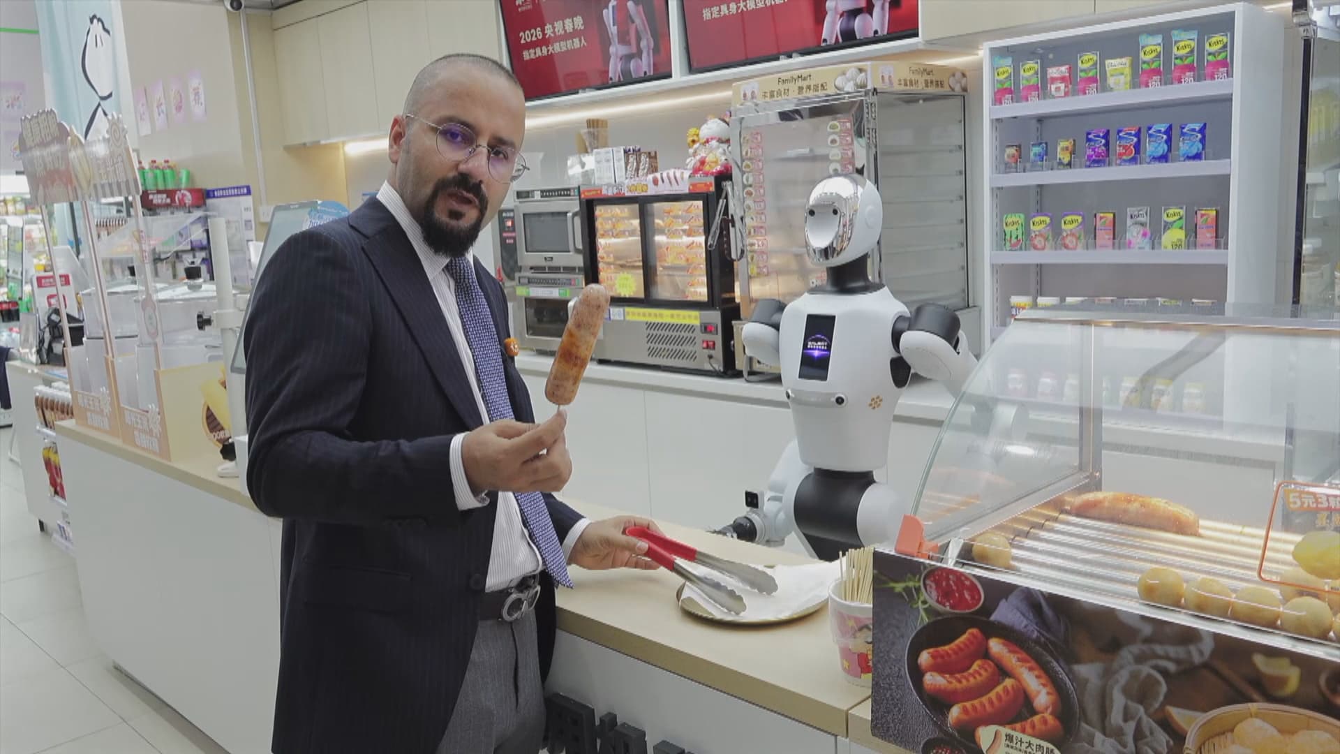 Serdema robotan li Çinê, li dermanxane û kolanan dixebitin