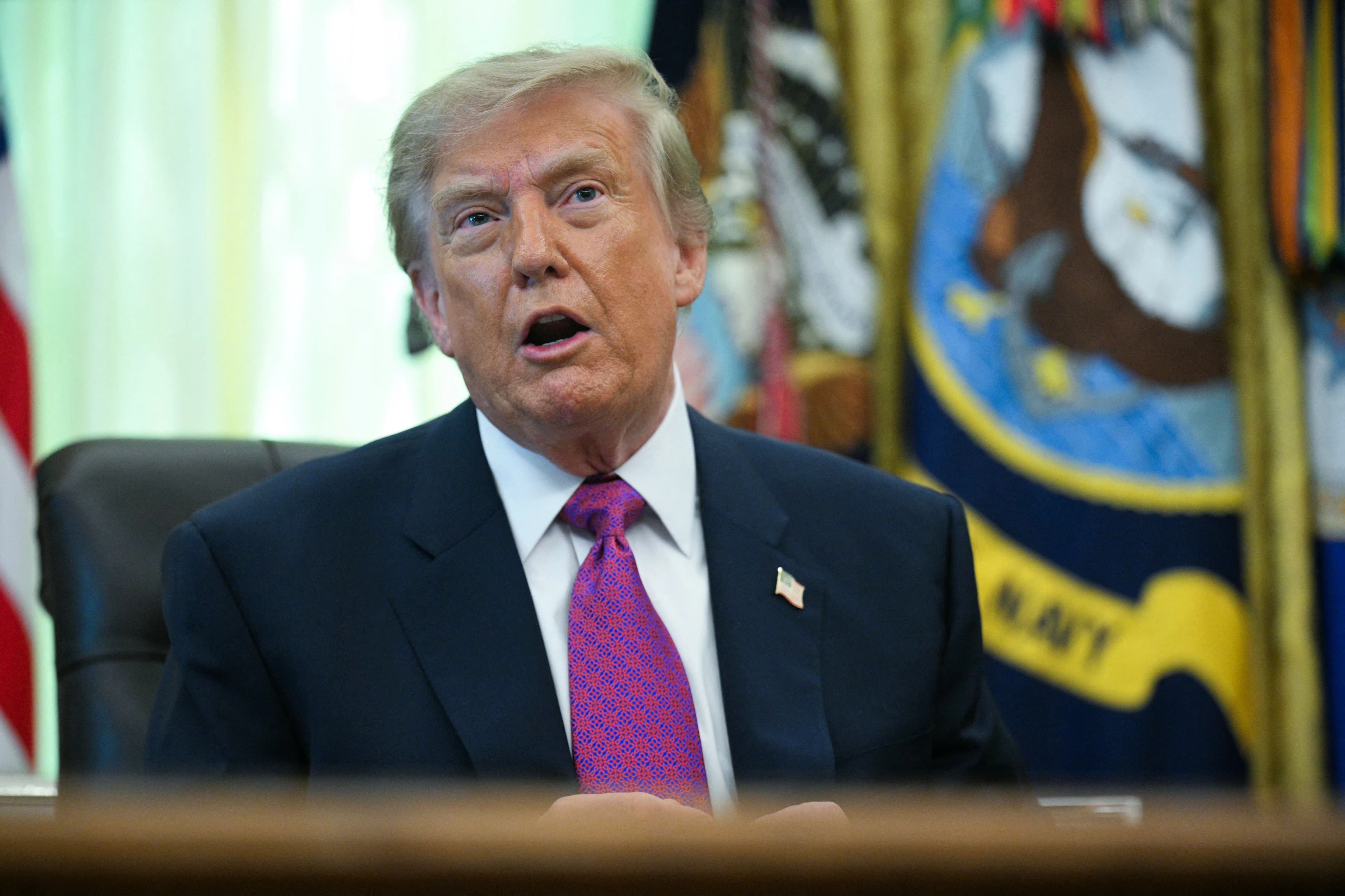 Trump signals further action against Iran after strikes on US bases