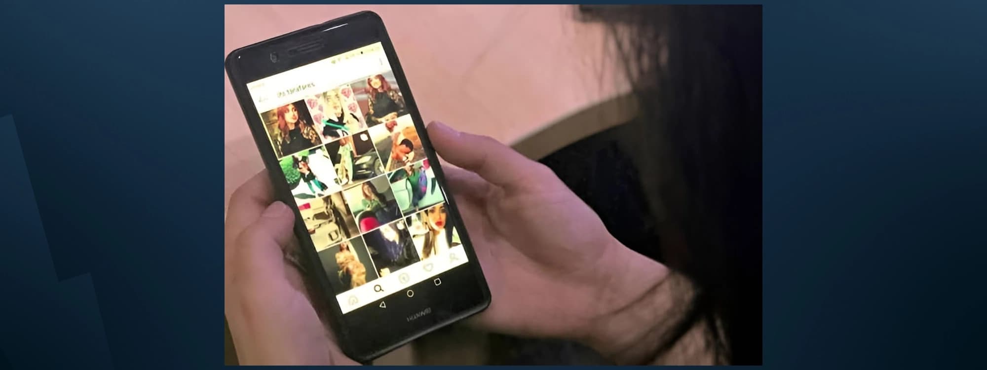 A woman looking at her phone in Baghdad on September 28, 2018. Photo: AFP
