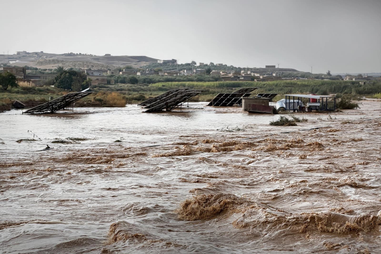 Seven dead, four missing as floods batter Syria