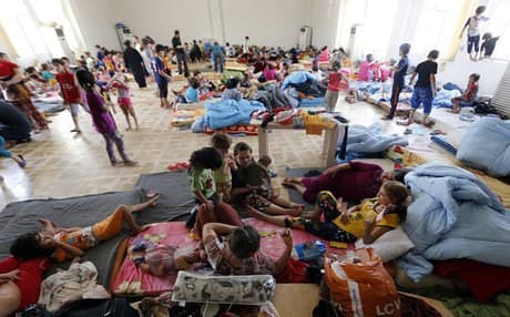 Christian families in Erbil after fleeing an ISIS onslaught in June. AFP file photo.
