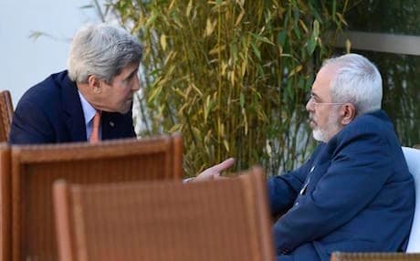 U.S. Secretary of State John Kerry, left, talks with Iranian Foreign Minister Mohammad Javad Zarif, in Geneva, Switzerland, Saturday, May 30, 2015. Top U.S. and Iranian diplomats are gathering in Geneva this weekend, hoping to bridge differences over a nuclear inspection accord and economic sanctions on Tehran — AP Photo.