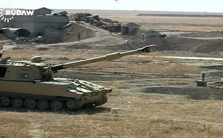 Photo of Iraqi forces on the outskirts of Qaraqosh on Saturday.