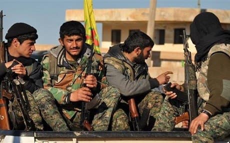 YPG fighters take a break from fighting in northeastern Syria. Photo:AFP