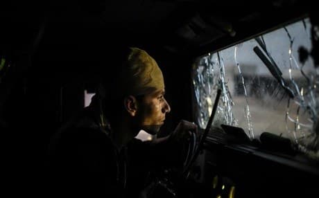 A member of the Iraqi special forces drive a military vehicle towards the village of Bazwaya, on the eastern edges of Mosul: Photo: AFP