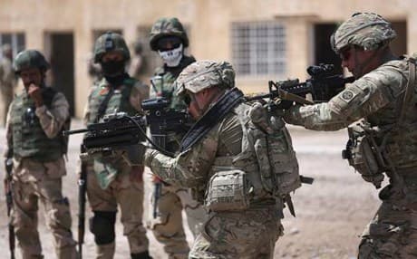 The US policy towards the Shiite paramilitary shifted in December, training hundreds of its members despite concerns over the group’s violations of human rights. Photo: AFP