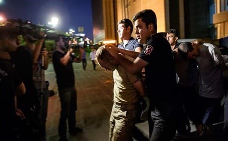 Turkish police arresting army officers accused of participation in the coup attempt. July 2016. AFP photo