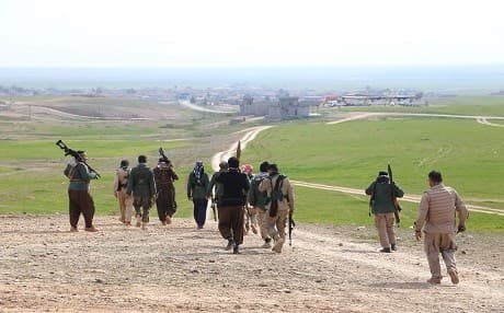 Kurdish Peshmerga forces descending into the village of Sultan Abdullah south of Kirkuk in the early days of the war against ISIS. Photo by Farzin Hassan/Rudaw