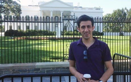 Shivan Fazil stands in front of the White House while visiting the United States.