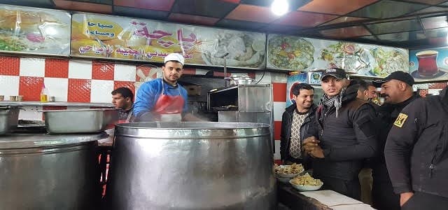 It was a very busy restaurant. There were more servers than I could count and more customers than they could tend to. Photo by author