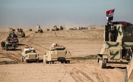 Iraqi forces pictured south of Mosul on Sunday. Photo: AFP/Ahmad al-Rubaye