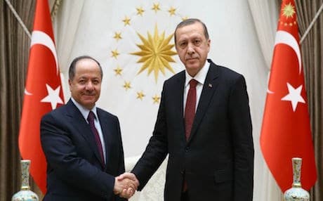 Kurdish President Masoud Barzani (L) shakes hands with Recep Tayyip Erdogan in Turkey. AFP file photo