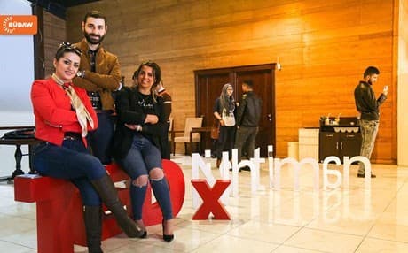 Volunteers work on preparing the final arrangements for TEDxNishtiman. Photo: Rudaw TV