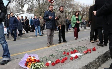 People gather at the site of a bombing in Ankara in March 2016. TAK claimed responsibility for the attack that killed 37. Photo: AP