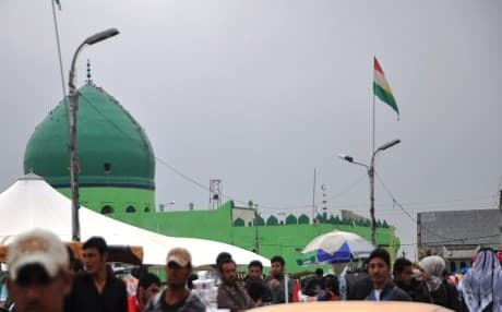 Flag of Kurdistan fly high in the city center of Kirkuk. The Baathi-era name of Taamim means nationalization after the nationalization of the Iraqi oil in early 1970s. Rudaw file photo.