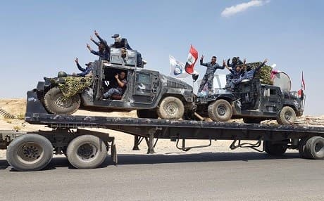 An Iraqi Federal Police convoy head towards Tal Afar on Tuesday. Photo: AFP/Federal Police