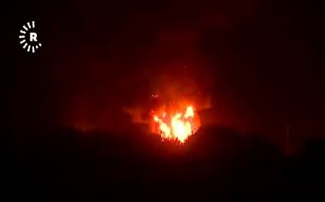 Big fire caused by an explosion at a weapons storage of the Zeravani Peshmerga force near Erbil International Airport.