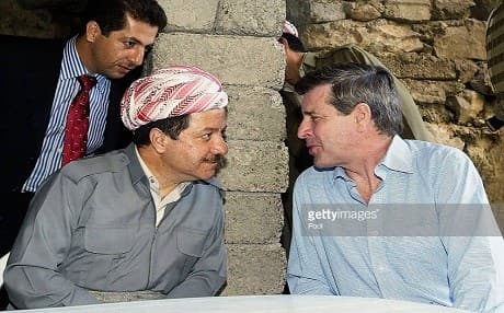 Iraq's outgoing overseer Paul Bremer chats with head of the Kurdistan Democratic Party, Masoud Barzani (L), during his Kurdish visit on June 22, 2004 in Erbil. File photo: AFP via Getty