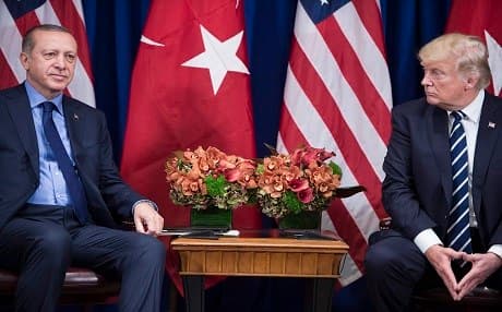 Turkey's President Recep Tayyip Erdogan and US President Donald Trump wait for a meeting at the Palace Hotel during the 72nd United Nations General Assembly September 21, 2017 in New York City. / AFP / Brendan Smialowski
