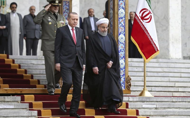 Iranian President Hassan Rouhani, right, welcomed Turkish President Recep Tayyip Erdogan, left, to Tehran’s Saadabad Palace on Wednesday. Photo: Ebrahim Noroozi/AP