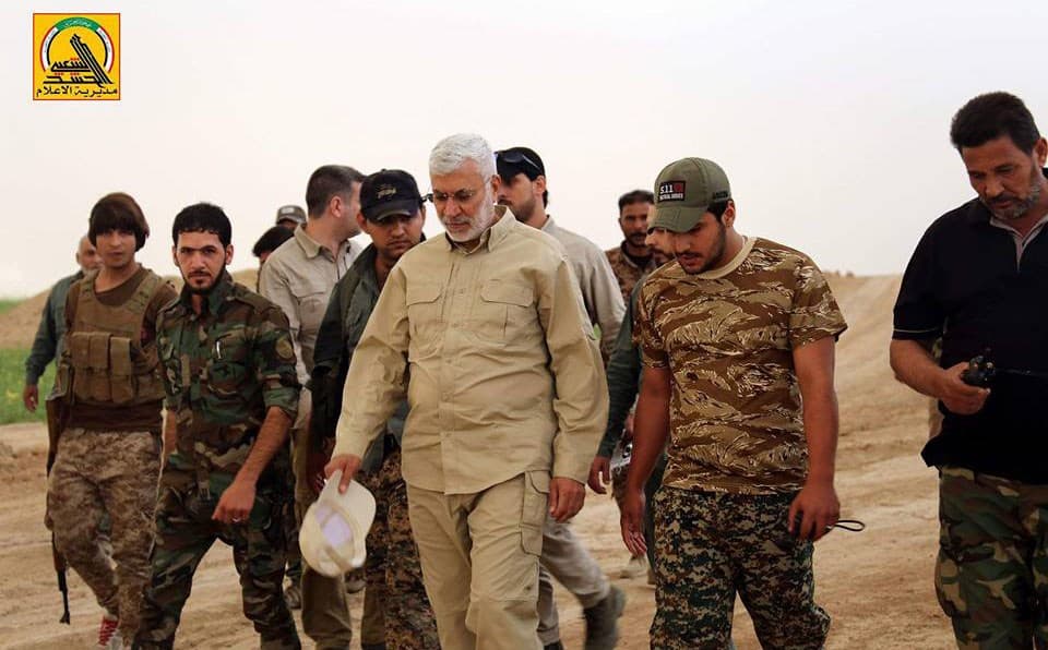 Abu Mahdi al-Muhandis with Hashd al-Shaabi forces in April. Photo: Hashd al-Shaabi