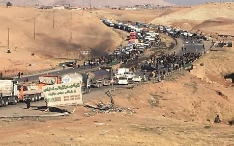 People protest on the main Suli-Kirkuk road in Chamchamal on Saturday. Photos: Swara Bilal | Rudaw